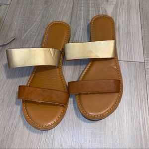 brown and gold strapped sandals